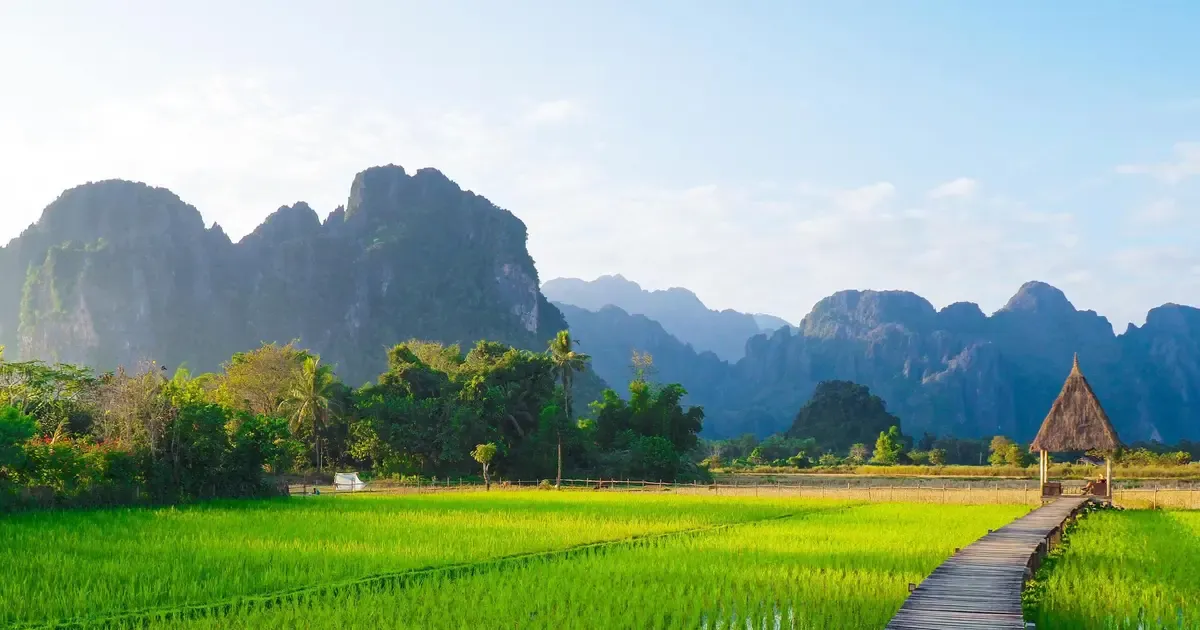 Hot air balloons over the karst mountains of Vang Vieng, Laos